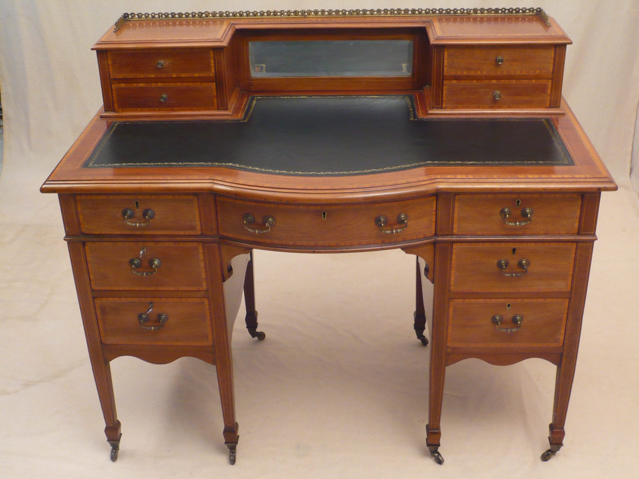 ANTIQUE - A LATE VICTORIAN WRITING TABLE